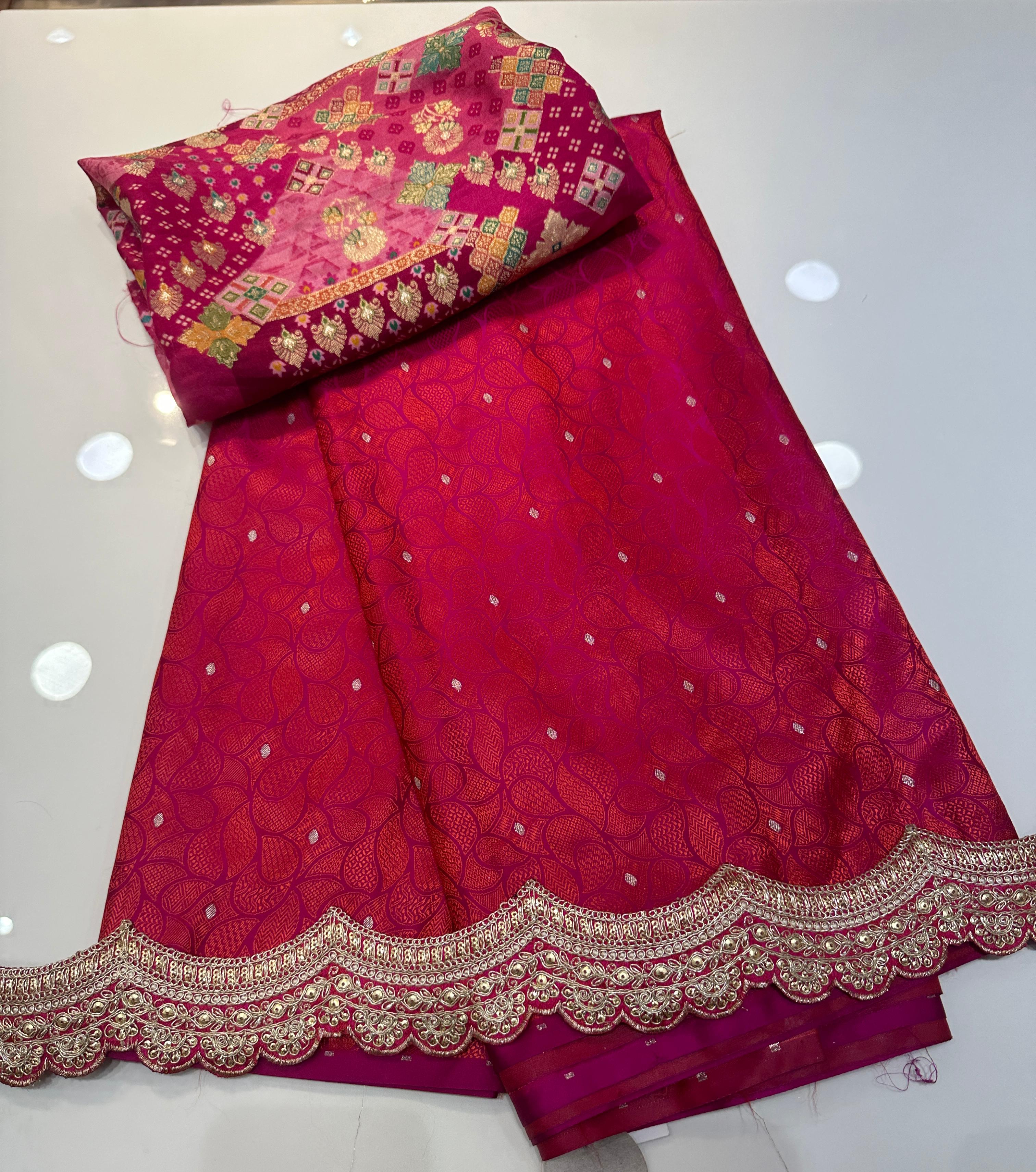 Beautiful Banarasi Silk Saree In Red With Scalloped Lace Border And Stitched Blouse