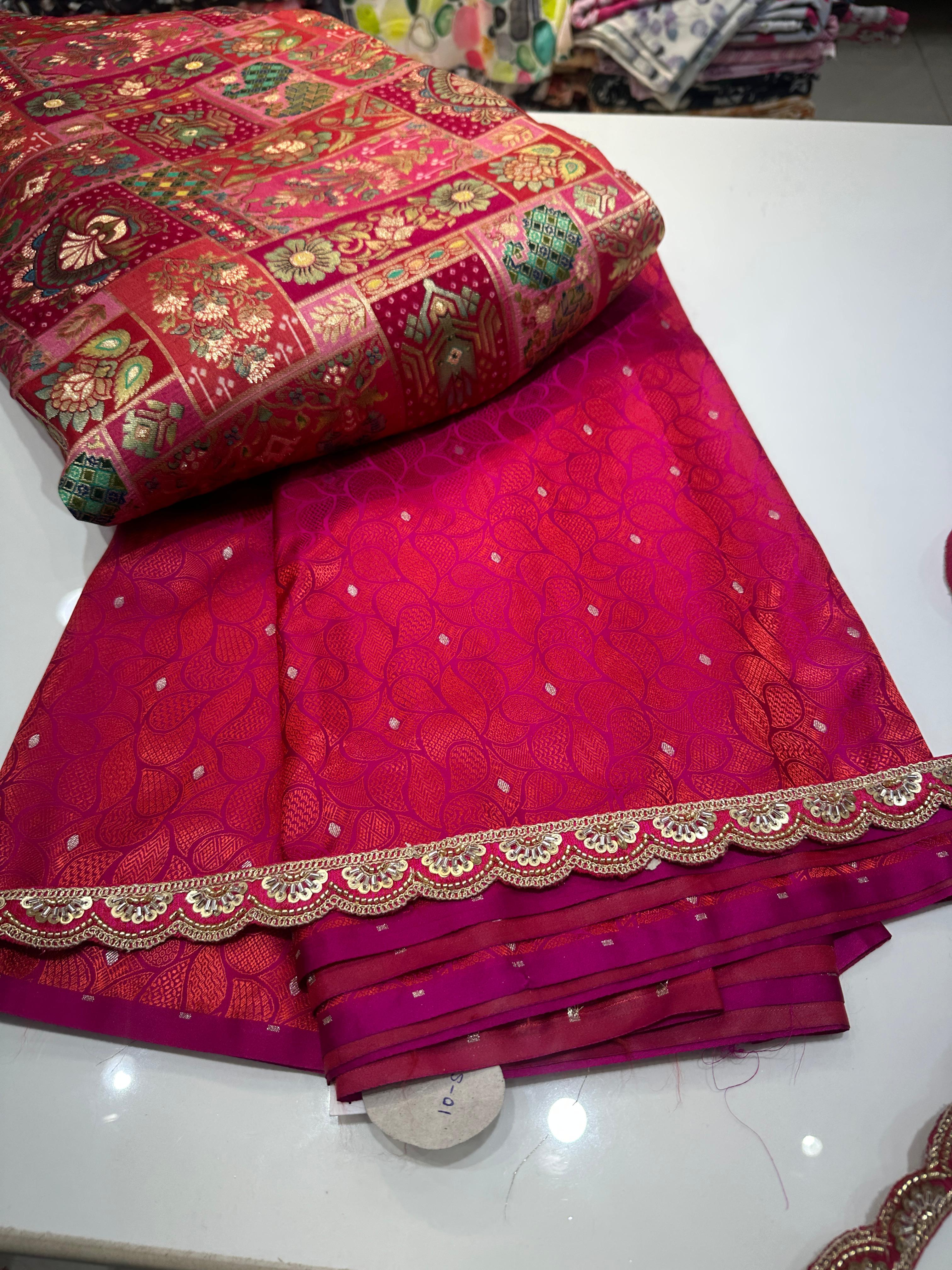 Beautiful Banarasi Silk Saree In Red With Scalloped Lace Border And Stitched Blouse