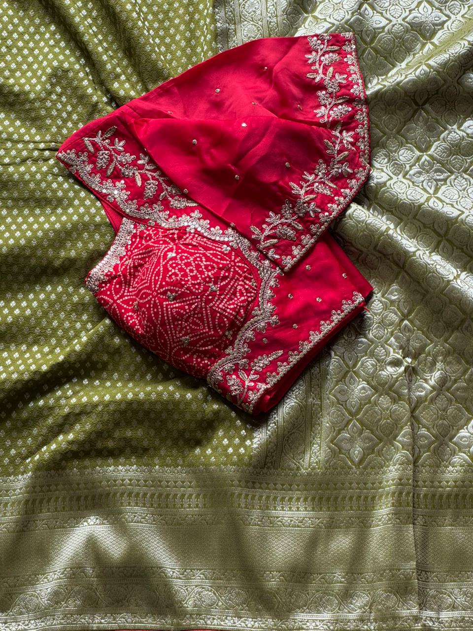 Designer Premium Banarasi Silk Dyed Saree In Olive Green-Red With Contract Piping Border And Stitched Blouse