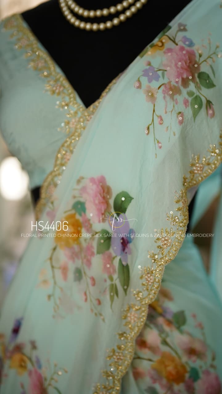 Floral Printed Pure Chinnon Crepe Powder Blue Silk SareeWith Zardosi Hand Embroidery